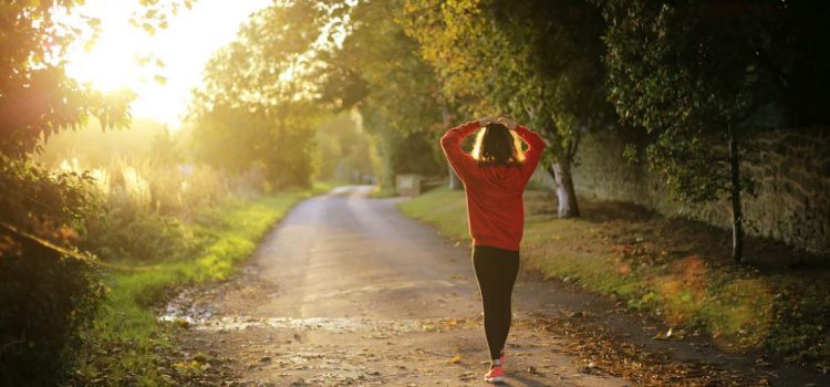 woman taking a walk in fall