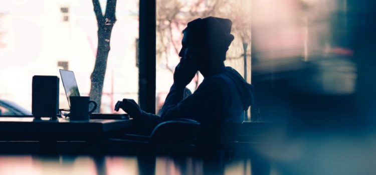 man working in a cafe