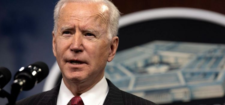 What Is “Bidenomics”? Is It the New Reaganomics? President Joe Biden talking into a microphone.