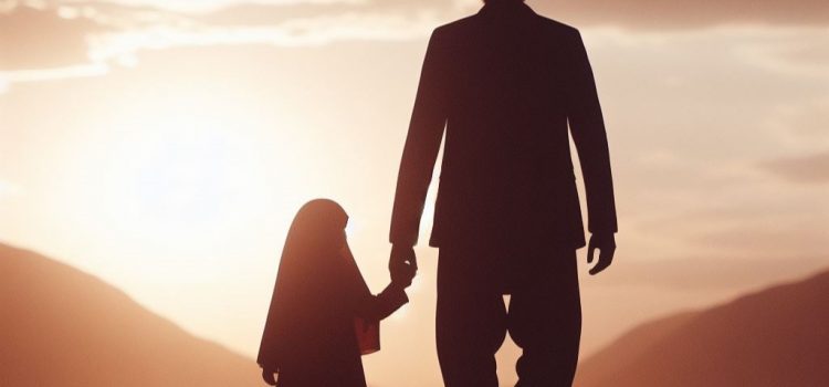 A young girl holding hands with her father in front of a sunset