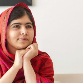 Malala Yousafzai holding her hands
