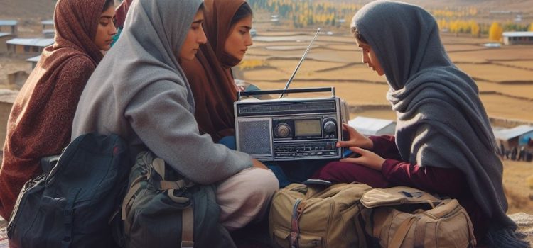 Pakistani women listening the radio in the mountains