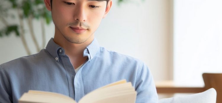 A young man reading a book