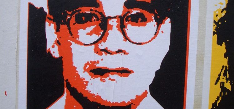 Red and white pop art poster of Andrew Cunanan wearing glasses.