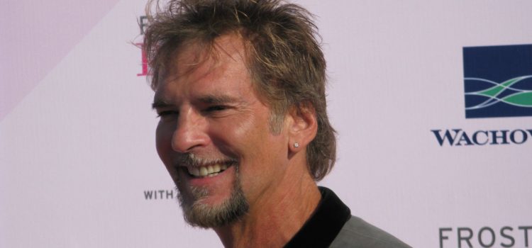 Kenny Loggins at a red carpet event.