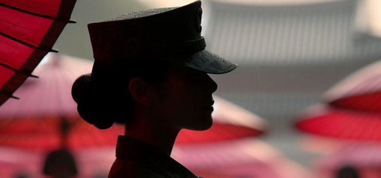 A silhouette of a South Korean female soldier.