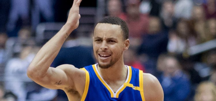 Basketball player and charitable Stephen Curry looking confused during a basketball game.