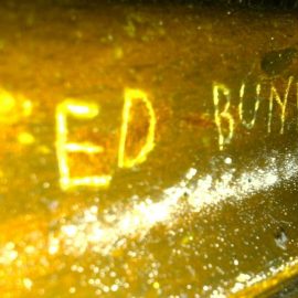 Ted Bundy's name carved into a wall.