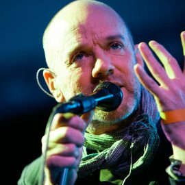 Michael Stipe lead musician of R.E.M. on stage