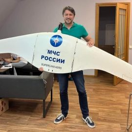 Serhiy Prytula holding a Russian drone captured by Ukrainian forces