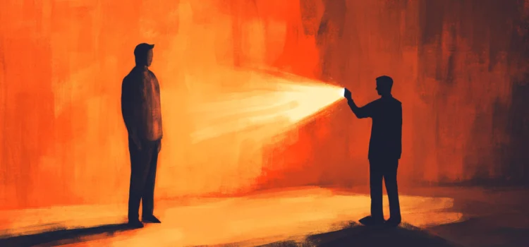 How to Make Someone Feel Seen and Truly Heard A man flashing a light on another person, showing how to make someone feel seen