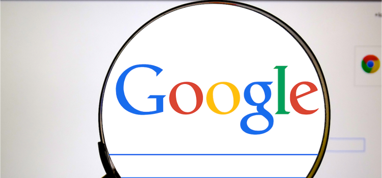 The Google Antitrust Ruling: A Pivotal Moment in Regulation A magnifying glass magnifying "Google" on the Google search homepage illustrates the Google antitrust ruling