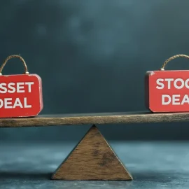 A balance scale with "ASSET DEAL" on one side and "STOCK DEAL" on the other illustrates asset deals vs. stock deals
