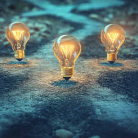 Light bulbs at crossroads with three paths going in different directions illustrates how to find insight
