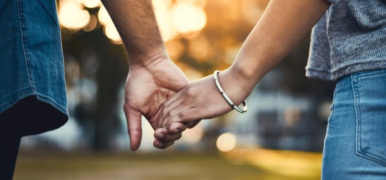 8 Rules of Love: How to Find It, Keep It, and Let It Go (Overview) A couple holding hands while outside