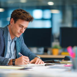 A manager working at their desk