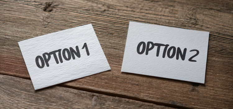 Two sheets of paper on a table that read OPTION 1 and OPTION 2