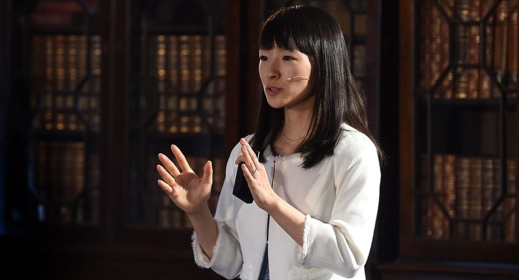 Marie Kondo giving a presentation at an event