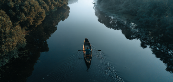 A man sailing down a river